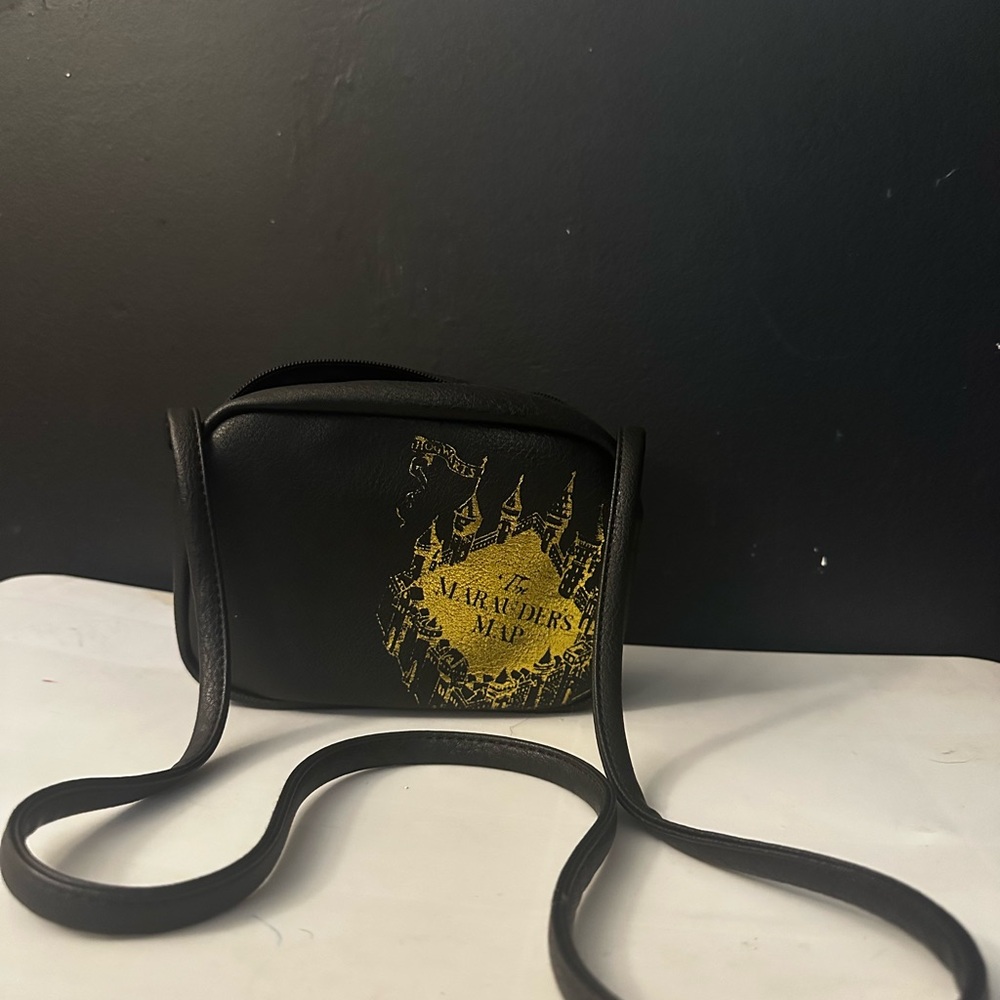 Black Crossbody Bag with Gold Print